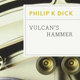 A crop of the cover of Philip K. Dick's novel Vulcan's Hammer shows gears on an off-white background and the book's title.